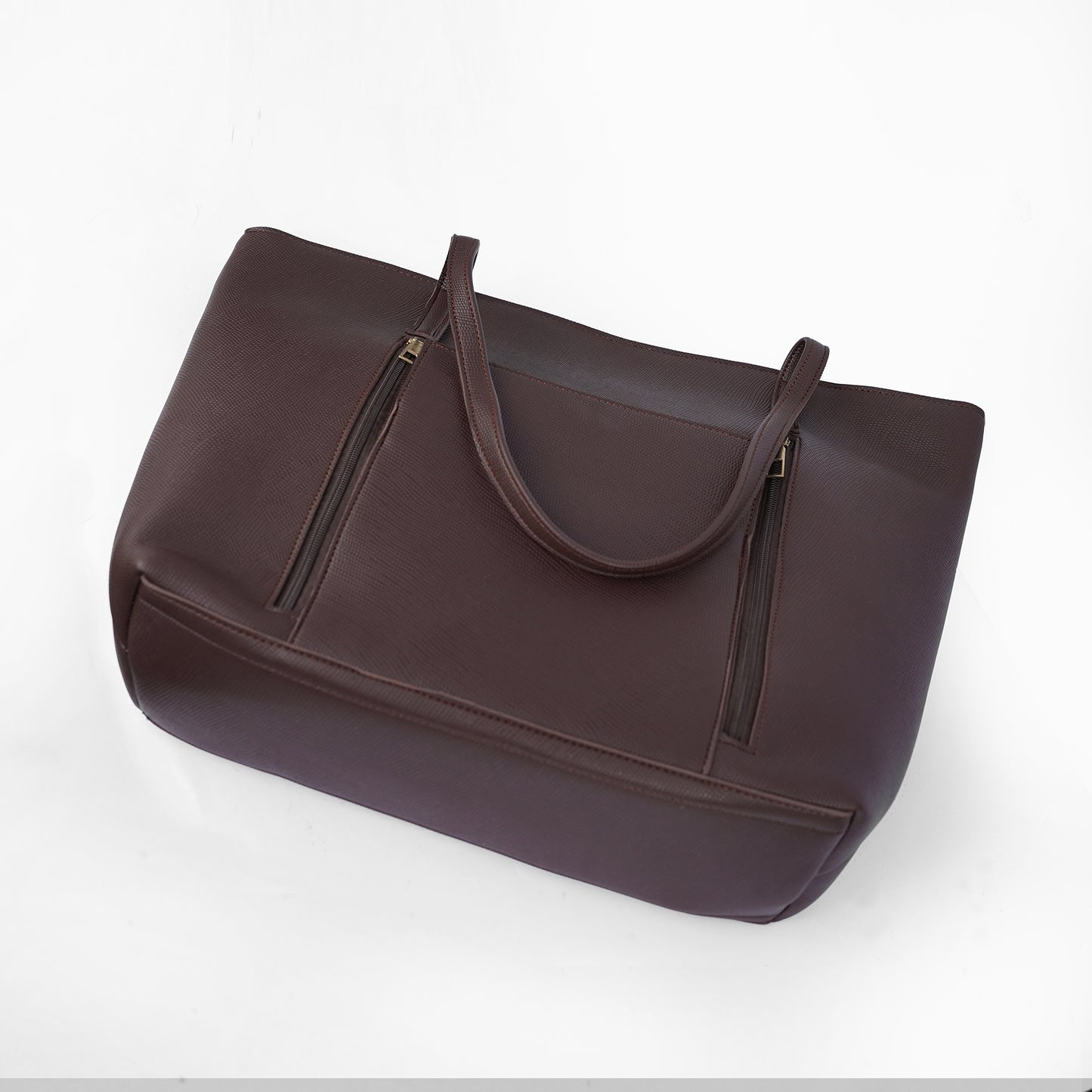 Angled top view of the Zara coffee brown tote bag, highlighting the structured design and rich color