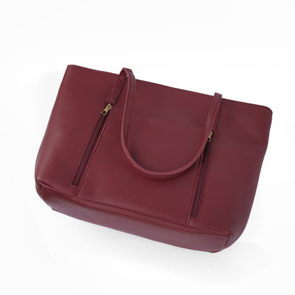Angled top view of the Zara maroon handbag, showcasing the elegant design and subtle shine of the material