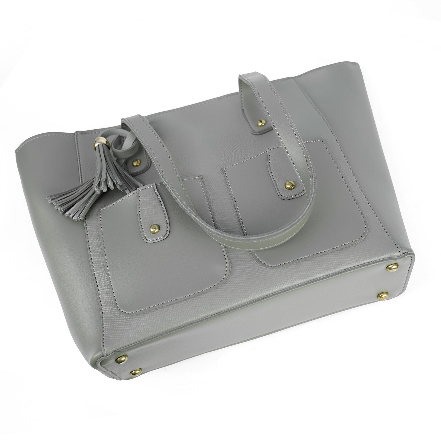 Angled view of the Alizeh grey tote bag, highlighting the chic tassel detail and structured design