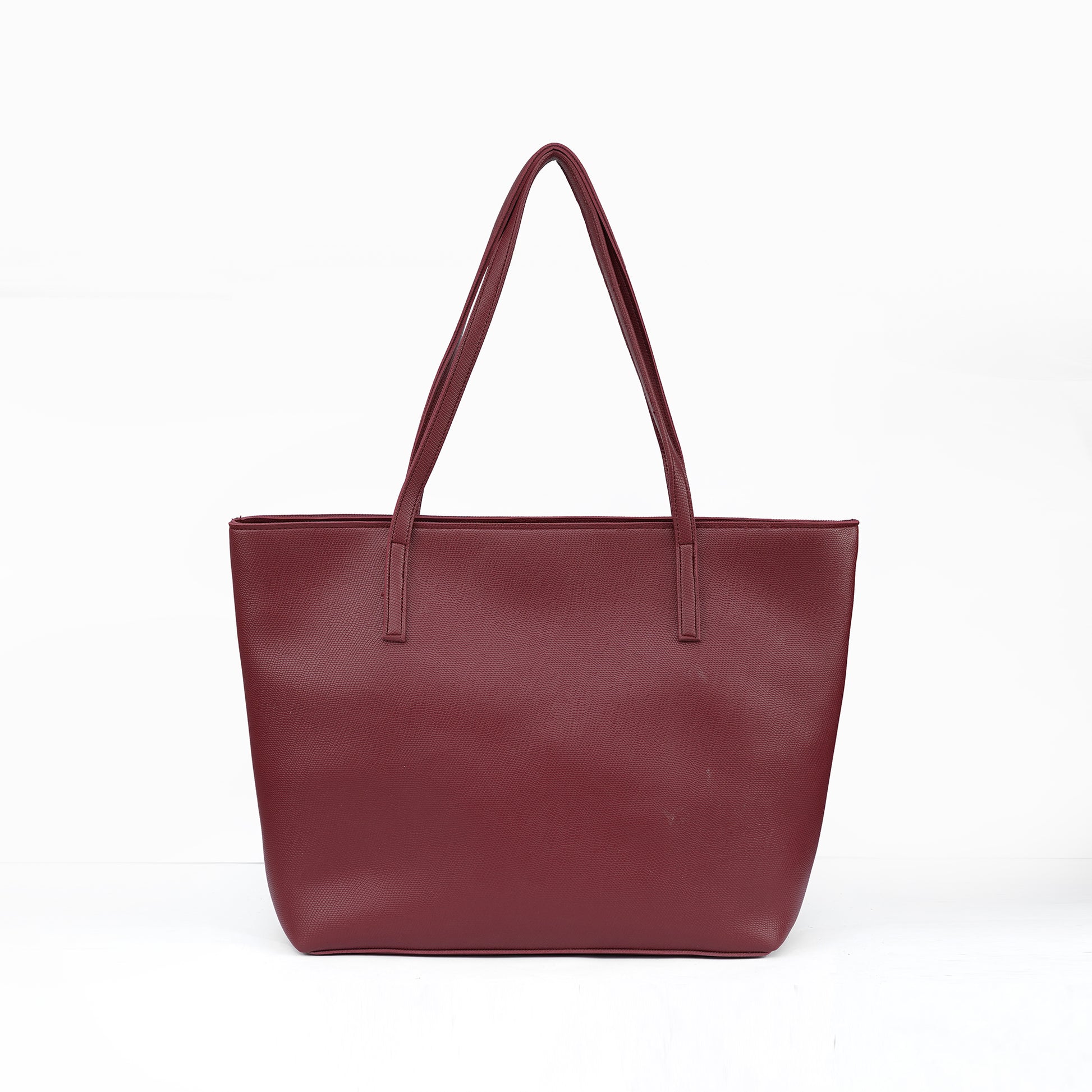Back view of the Zara maroon everyday tote bag, showing the plain side in its rich color.