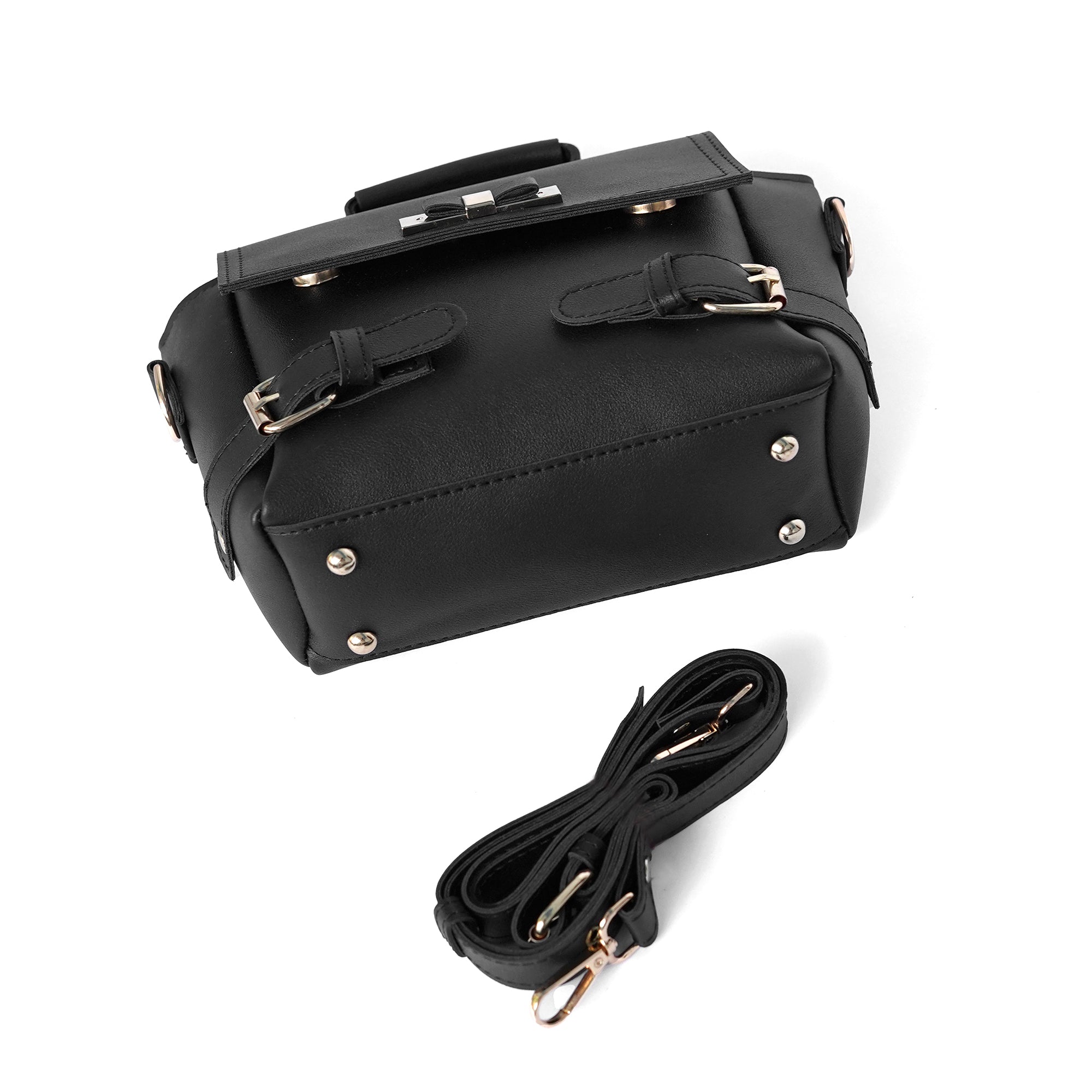 Black women’s satchel – side profile with adjustable strap and hardware