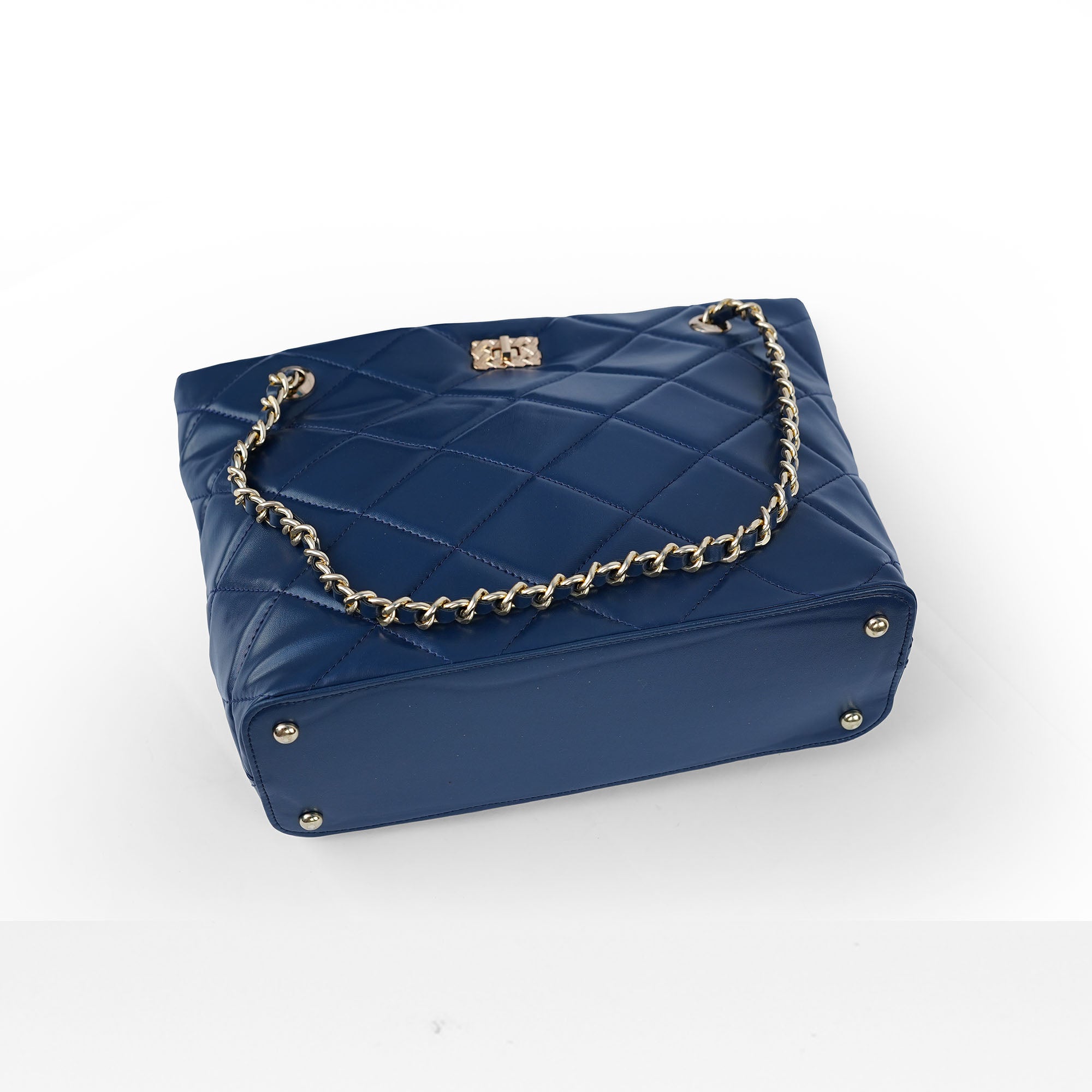 Blue chain tote – base studs and chain detail