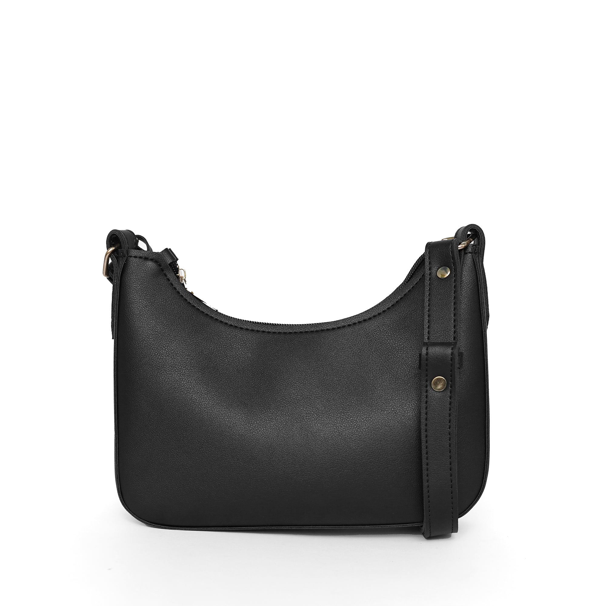 Detailed view of black shoulder bag with gold hardware