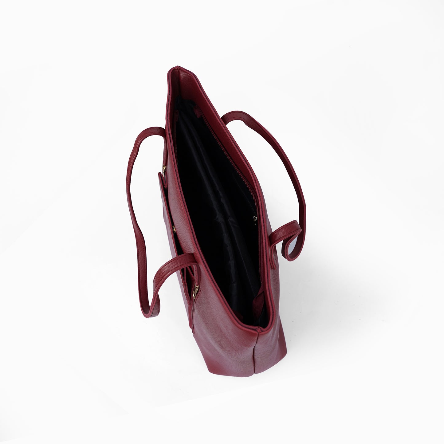 Interior view of the Zara maroon tote bag, displaying the organized interior with pockets