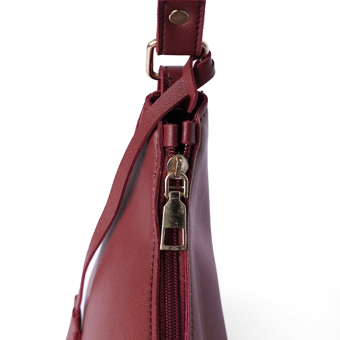Maroon shoulder bag with handle design and zip closure