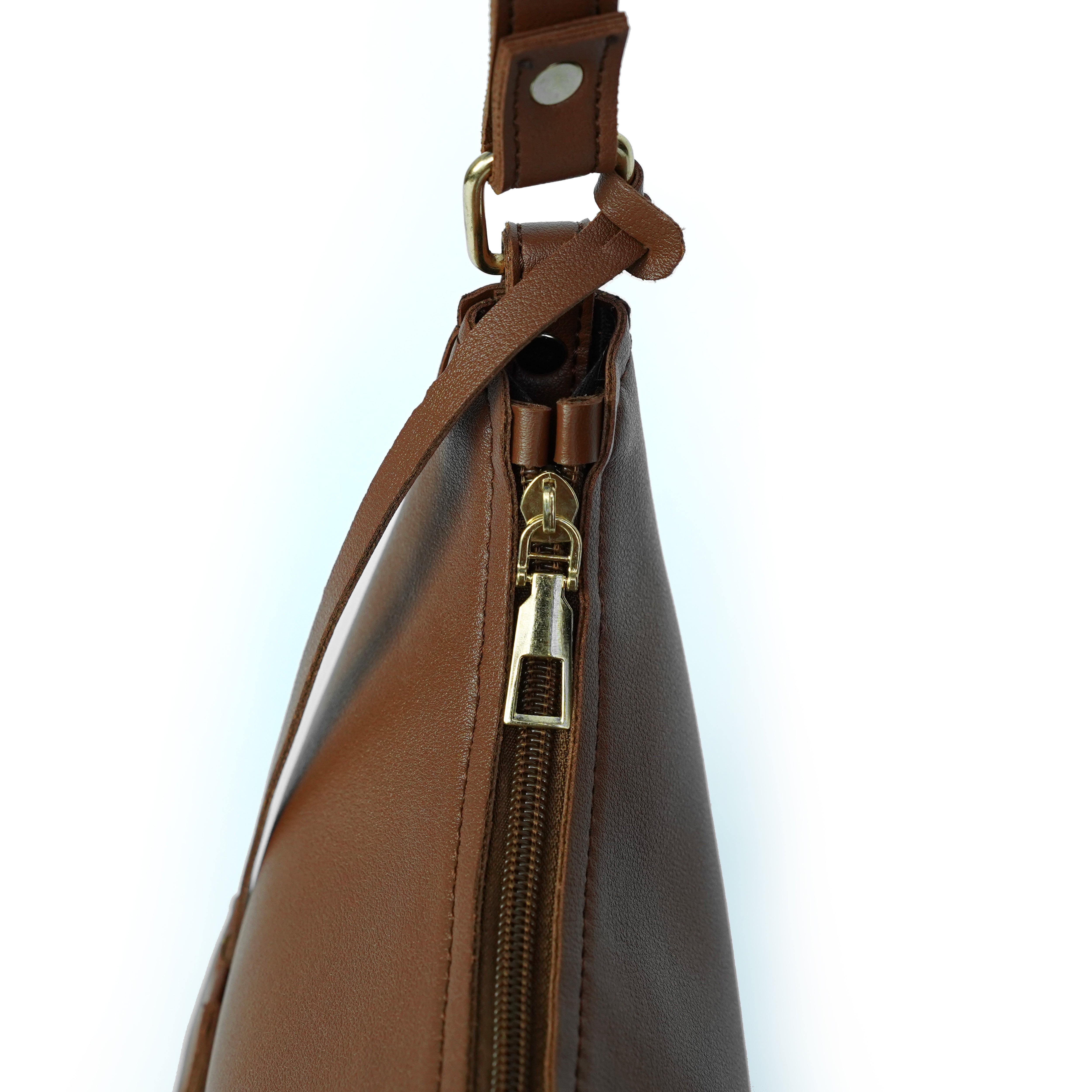 Zipper detail of brown faux leather shoulder bag