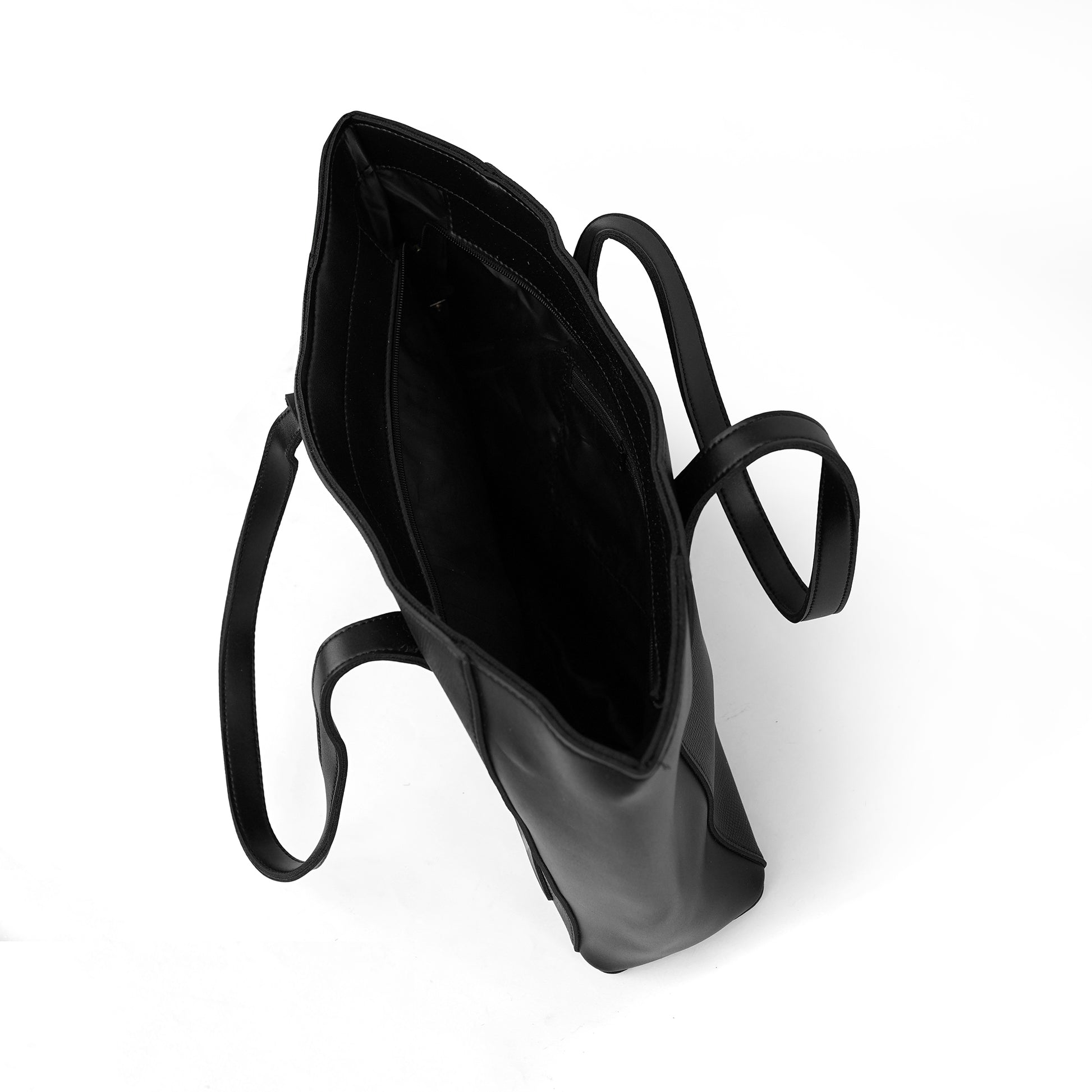 Interior view of the Alizeh black structured tote bag, showcasing its spacious main compartment