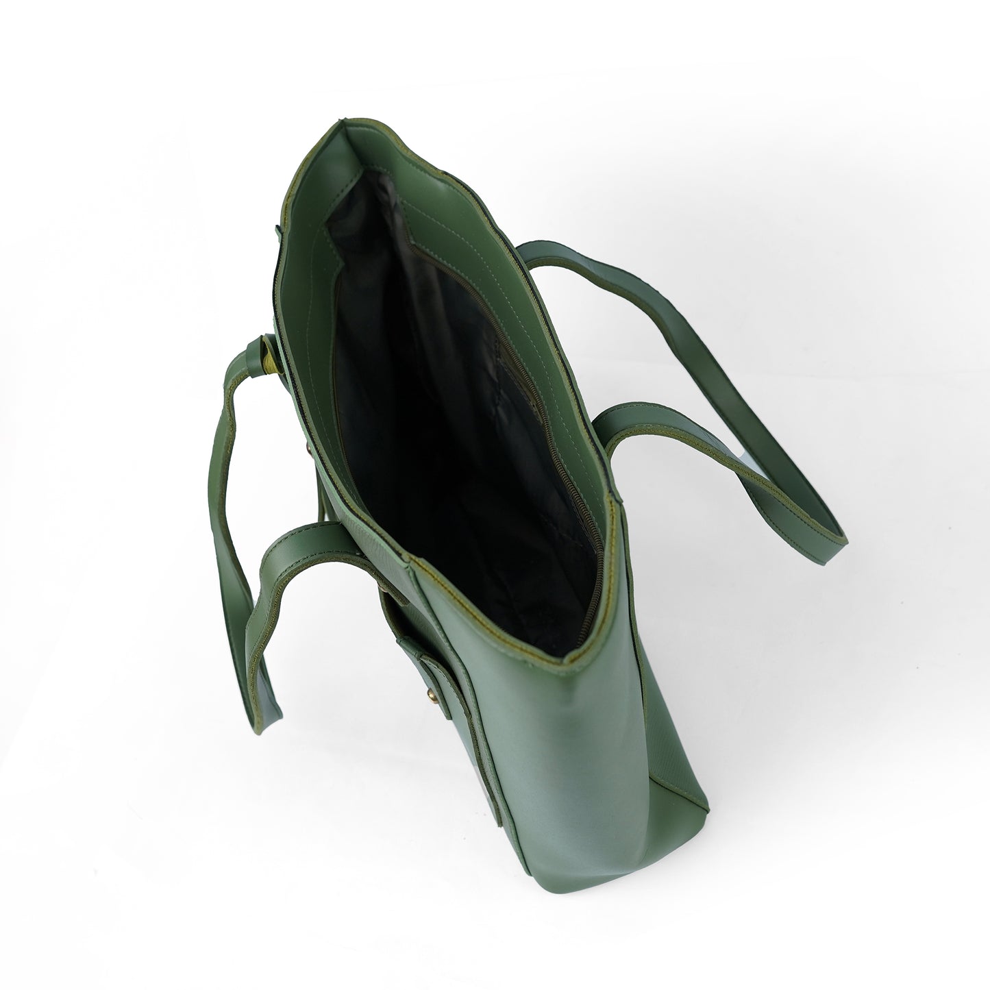 Interior view of the Alizeh green handbag, showcasing its spacious and organized interior