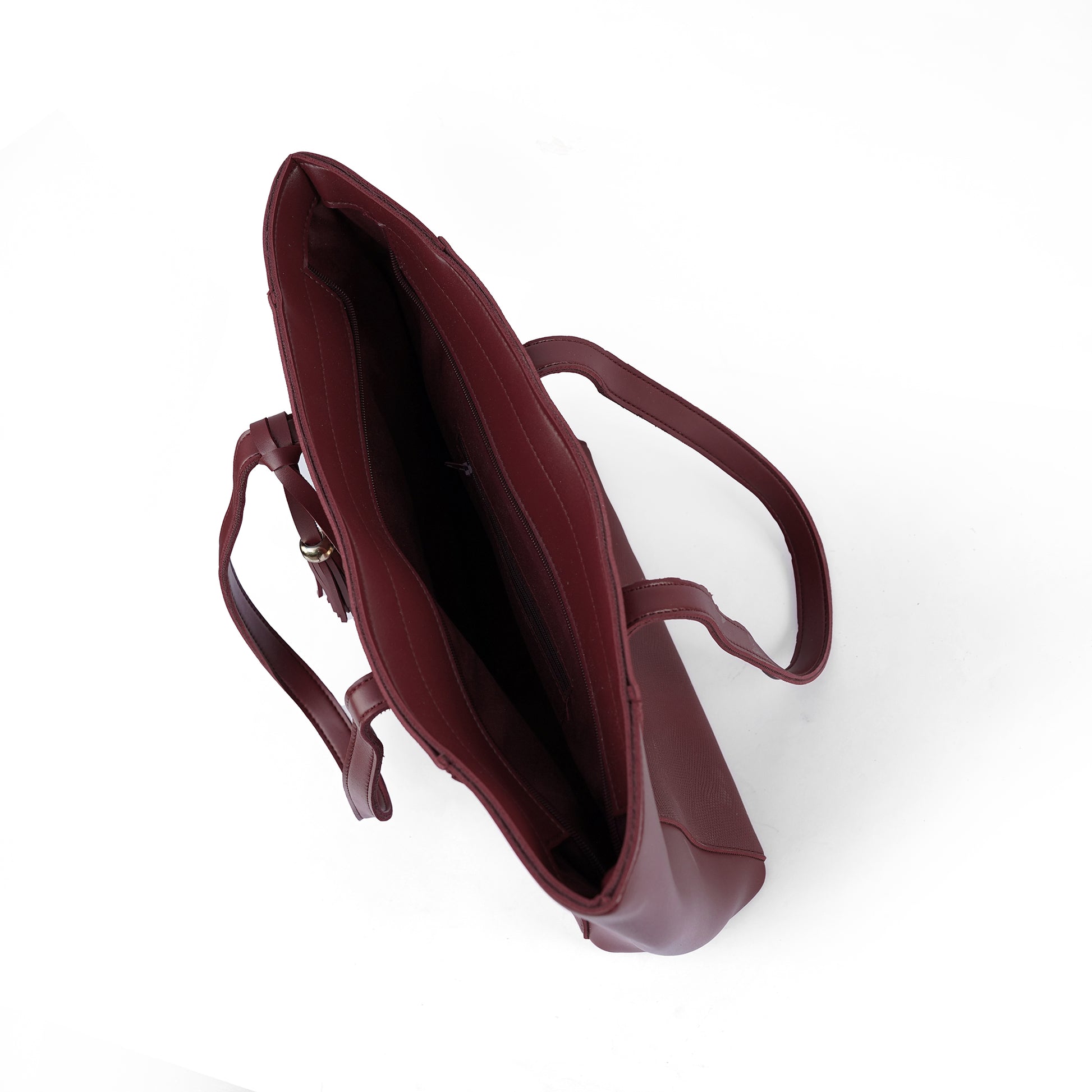 Interior view of the Alizeh maroon tote bag, showcasing its roomy interior for all daily essentials