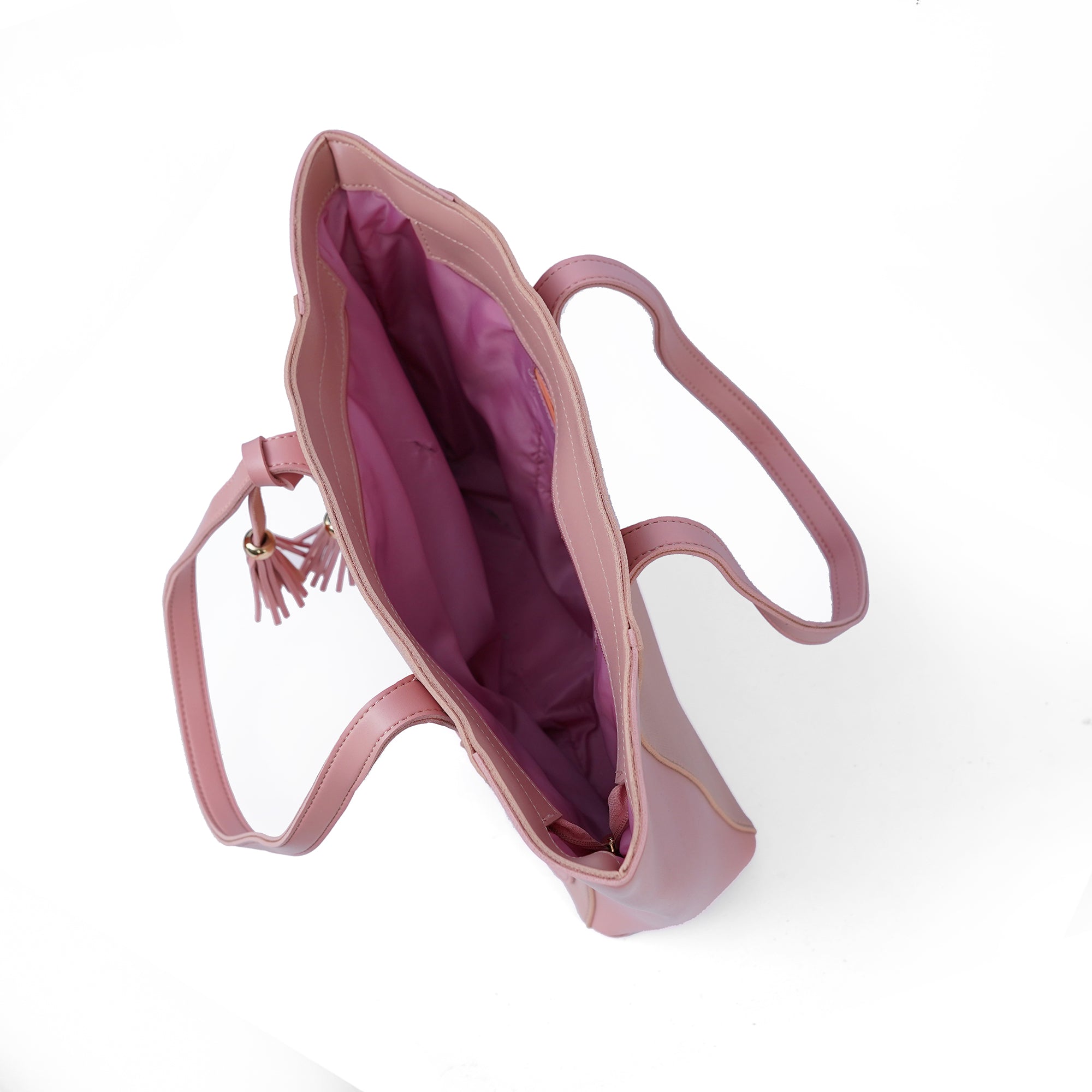 Interior view of the Alizeh pink handbag, showcasing its generous interior and organized compartments