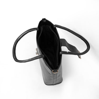 Interior view of the Serena black tote bag showing the spacious main compartment and zip pocket